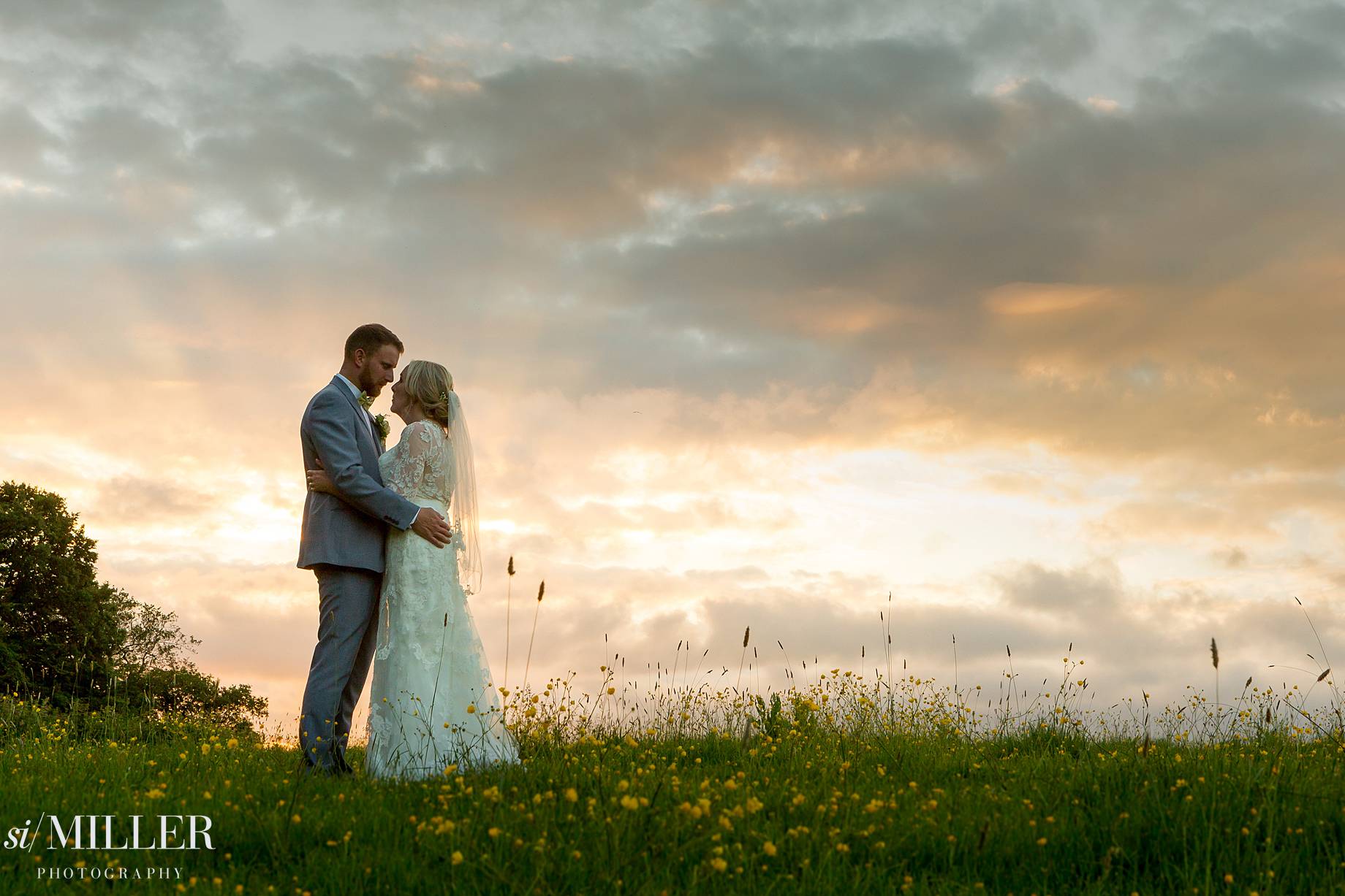 wedding couple with sunset behind at Ferraris country Hotel